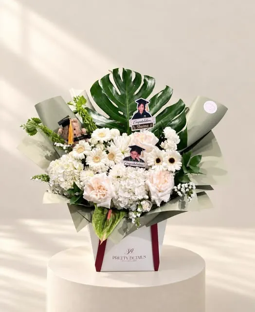 Graduation arrangement with photos
