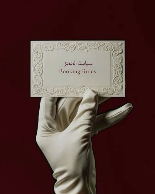 The Pretty Details booking card, held in a white glove