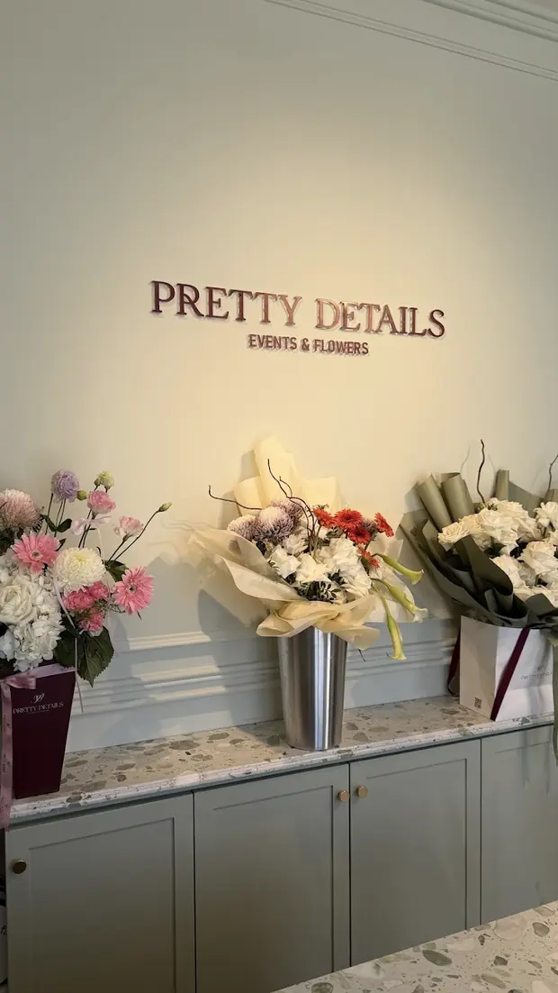 Inside the Pretty Details shop, with the Events and Flowers sign on the wall
